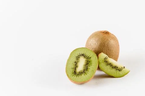 Kiwi fruit slices on white background. Citrus fruit. Healthy freshness food. Stock Photos