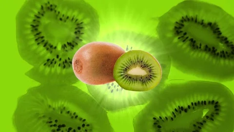 Kiwi on a green background. Rays of light. Stock Footage 216912121