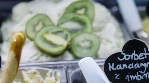 Kiwi ice cream on display Stock Footage 86259802