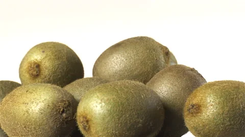 Kiwi isolated rotating on white background. Video stock 63348771