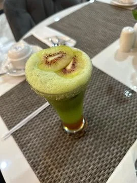 Kiwi juice on the table Stock Photos