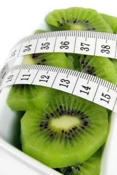 Kiwi with meter Stock Photos