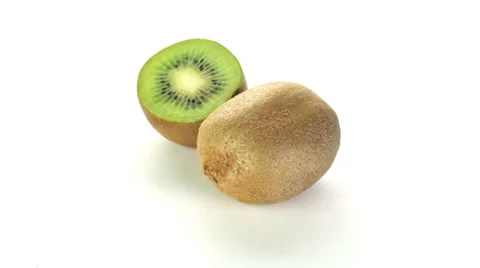 Kiwi rotates on a white background Stock Footage 37484298