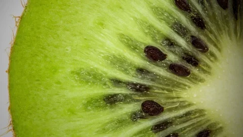 Kiwi rotation on white background - slice Stock Footage 79829247