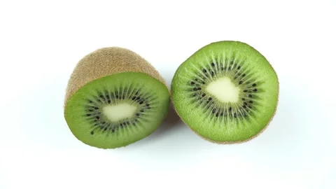 Kiwi in Section on a White Background. Video stock 257661156