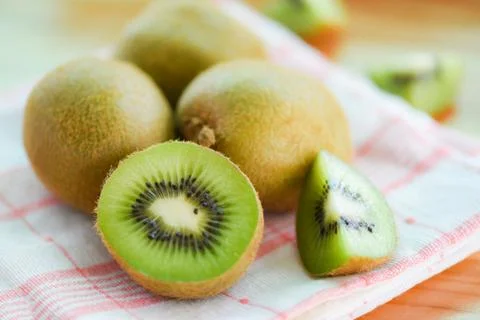 Kiwi slice on the table with kiwi fruit Stock Photos
