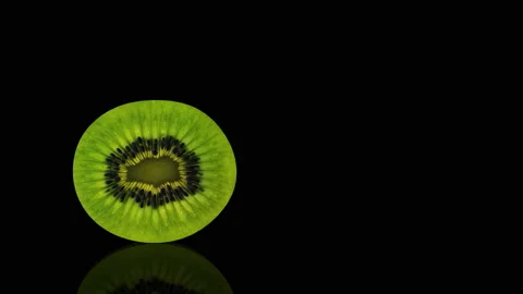 Kiwi Slice turns on itself animation Stock Footage 238554462
