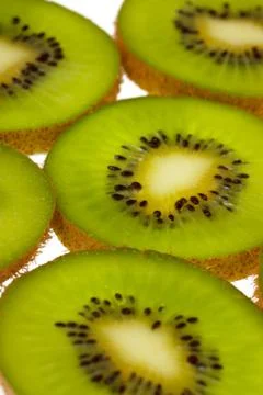 Kiwi slices Stock Photos
