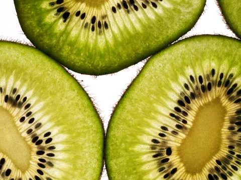 Kiwi slices Stock Photos