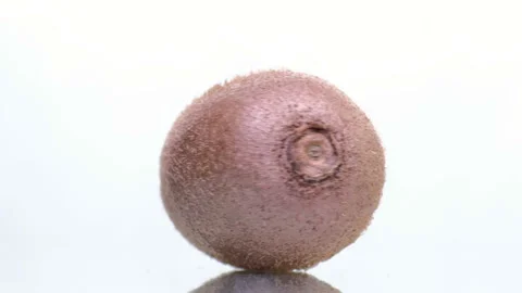 Kiwi on white background, rotate Stock Footage 88299125