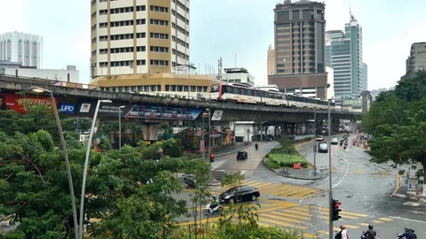 KL LRT Star train public transport passing through Plaza Rakyat station. 動画素材 114051273