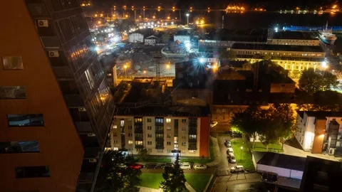 Klaipda, Lithuania - 2023.10.05 - Timelapse View of Klaipeda harbor at night. Stock Footage 253664487