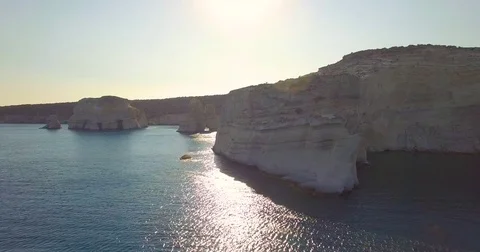 Kleftiko Rock Arches Milos Greece Aegean Mediterranean Sea Sunset. Stock Footage 77828443