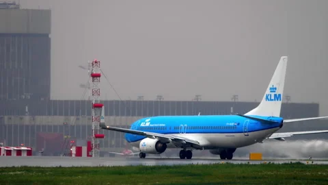 KLM Boeing 737-800 lining up on runway before takeoff at airport Stock Footage 343682307