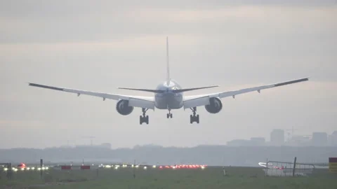 KLM Boeing 777-200ER Passenger Airplane Sunrise Landing, Rear View, Amsterdam Stock Footage 185656143