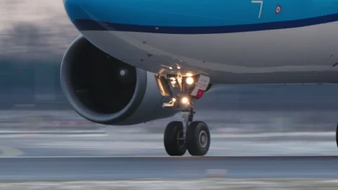 KLM Boeing engine and nose gear close-up during takeoff at Amsterdam Schiphol Stock Footage 334489817