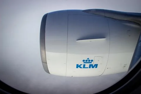 KLM engine airplane seen from inside the plane in the air Stock Photos