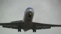 KLM plane flies over lamp post HD Footage