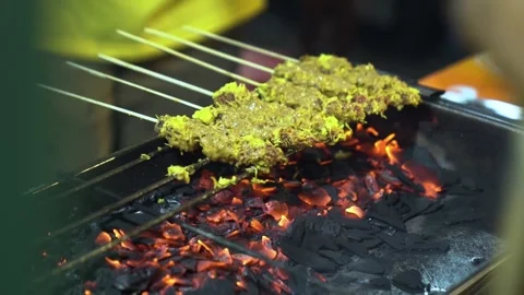 Klopo satay or also called coconut satay, this food is typical of Surabaya. 動画素材 265934671