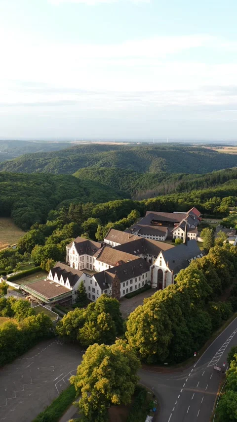 Kloster Reichenstein, monastery from the 12th century, Eifel landscape. Stock Footage 313080931