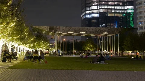 Klyde Warren Performance stage at night w/ audience- time-lapse Stock Footage 82577072