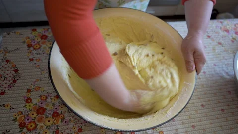 Knead the dough for Easter bread Stock Footage 147508409