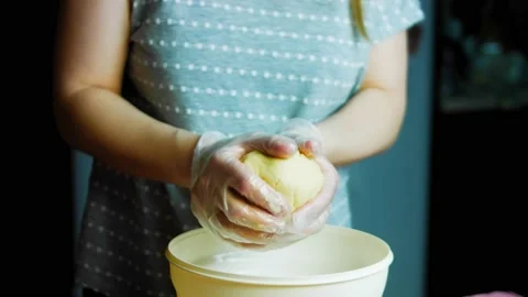 Knead the dough by hand for baking Stock Footage 169701985