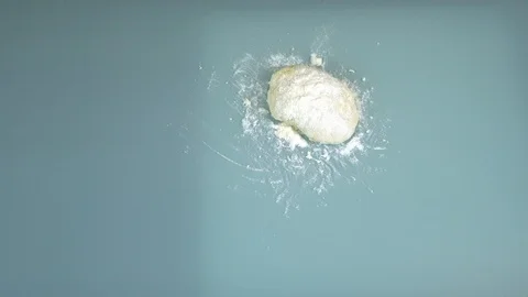 Knead flour dough on the table. Stock Footage 99044851
