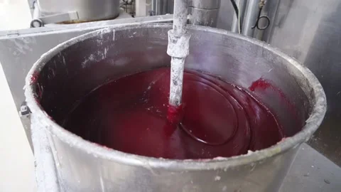Knead red mass for marshmallow or jam. confectionery factory sweets production Stock Footage 133187868