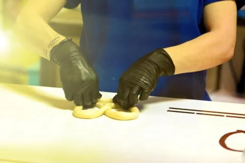 Kneading and making bread dough, female hand Stock Photos