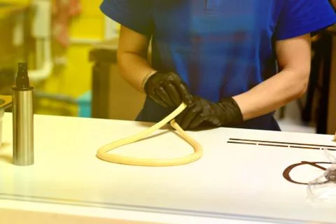 Kneading and making bread dough, female hand Stock Photos