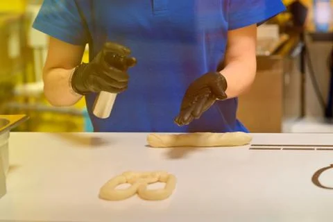 Kneading and making bread dough, female hand Stock Photos