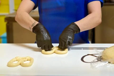 Kneading and making bread dough, female hand Stock Photos