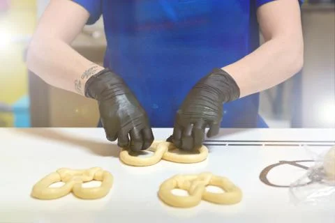 Kneading and making bread dough, female hand Stock Photos