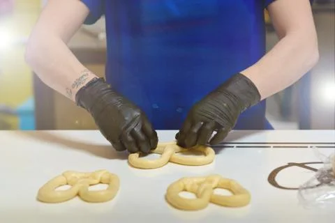 Kneading and making bread dough, female hand Stock Photos