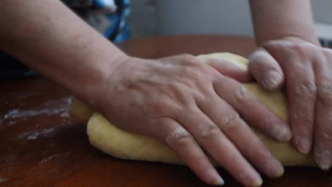 Kneading the baking dough on the table. Stock Footage 158356671