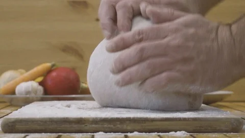 Kneading bread dough Stock Footage 126624227