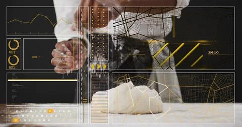 Kneading chef in white coat, patterned apron, pressing floured dough ball in Foto stock