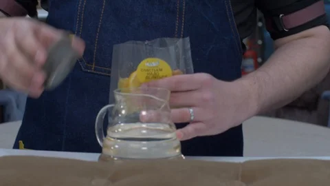 Kneading a cocktail in a teapot Stock Footage 130050211