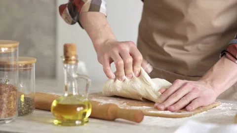Kneading dough for baking homemade bread Stock Footage 150459880