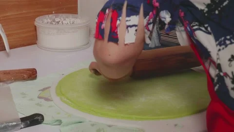 Kneading dough for baking With a rolling pin. Stock Footage 167238865