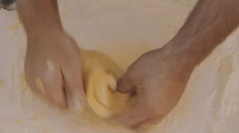 Kneading the dough with bare hands to make pasta Stock Footage 41848859