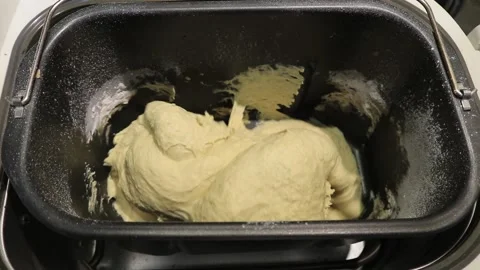 Kneading dough in a bread machine Stock Footage 196103769