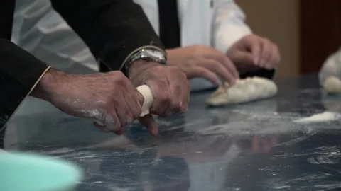 Kneading Dough in a Cooking Class Stock Footage 317472600