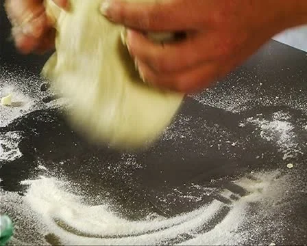 Kneading dough Stock Footage 10717857