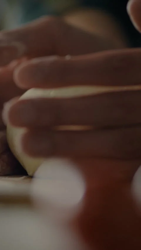Kneading dough for fresh bread in a cozy kitchen setting Stock Footage 331602075