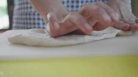 Kneading Dough for Fresh Bread Stock Footage 318938619
