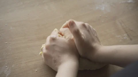 Kneading dough by hand Stock Footage