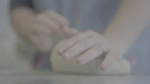 Kneading dough with hands Stock Footage 73881031