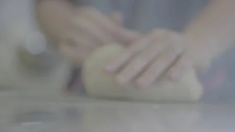 Kneading dough with hands Stock Footage 73881085